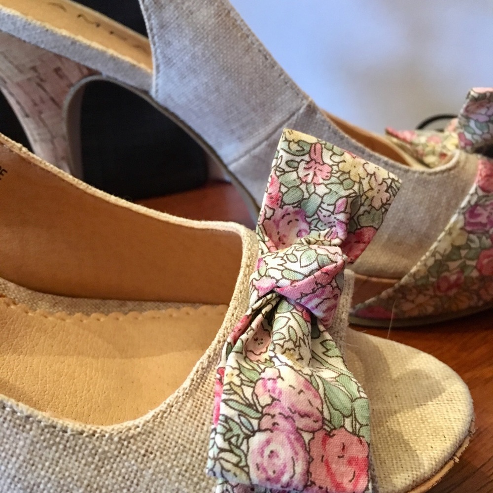 Neutral cork peep toe heel.